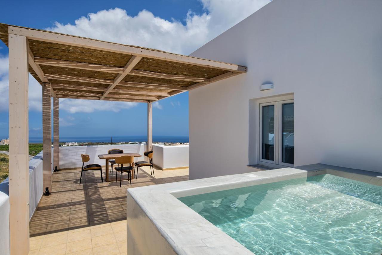 Aelia Luxury Suites Karterados  Exterior photo A private pool at a hotel in Greece