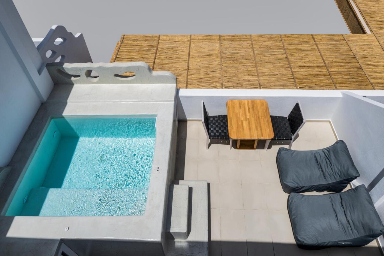 Aelia Luxury Suites Karterados  Exterior photo A private pool at a hotel